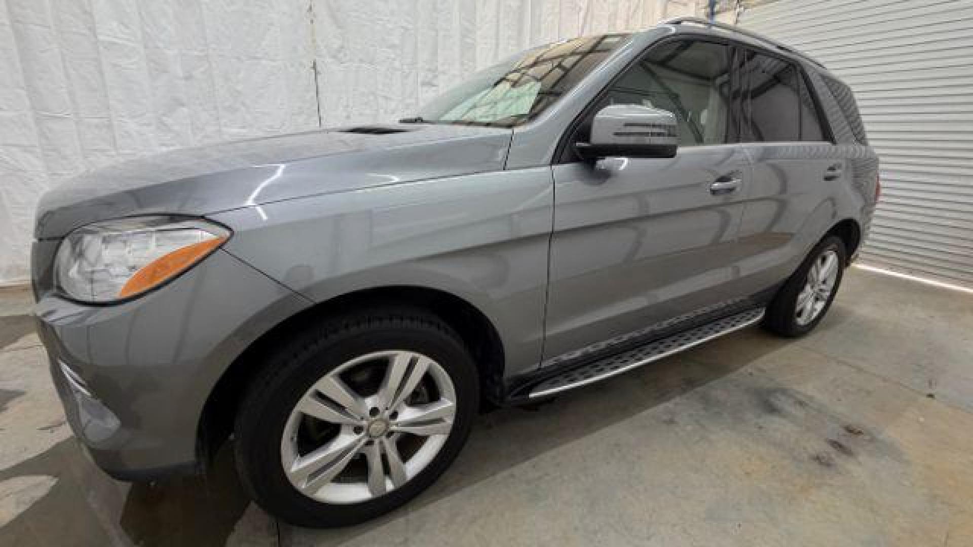 2015 Silver Mercedes-Benz ML 350 Class (4JGDA5JB3FA) , located at 1806 Veterans Memorial Hwy SW, Austell, GA, 30168, (770) 944-9558, 33.817959, -84.606987 - Photo#1