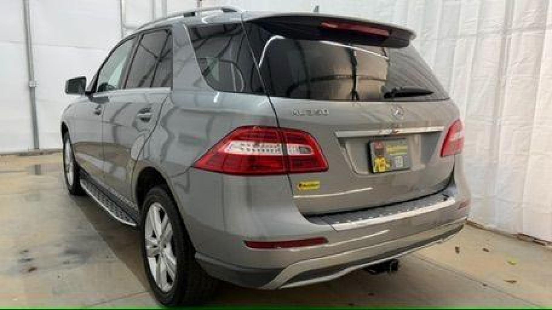 2015 Silver Mercedes-Benz ML 350 Class (4JGDA5JB3FA) , located at 1806 Veterans Memorial Hwy SW, Austell, GA, 30168, (770) 944-9558, 33.817959, -84.606987 - Photo#3