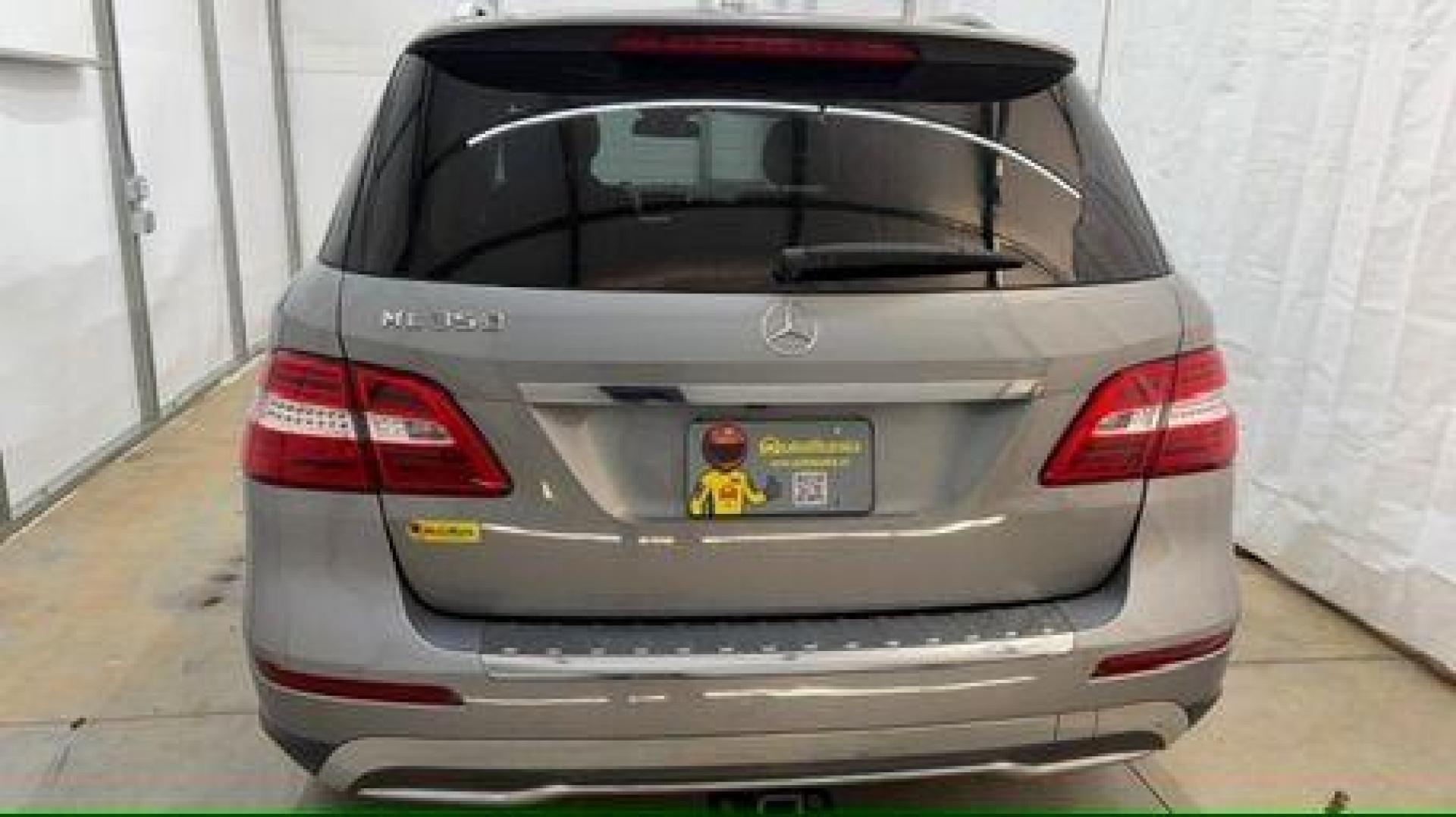 2015 Silver Mercedes-Benz ML 350 Class (4JGDA5JB3FA) , located at 1806 Veterans Memorial Hwy SW, Austell, GA, 30168, (770) 944-9558, 33.817959, -84.606987 - Photo#4