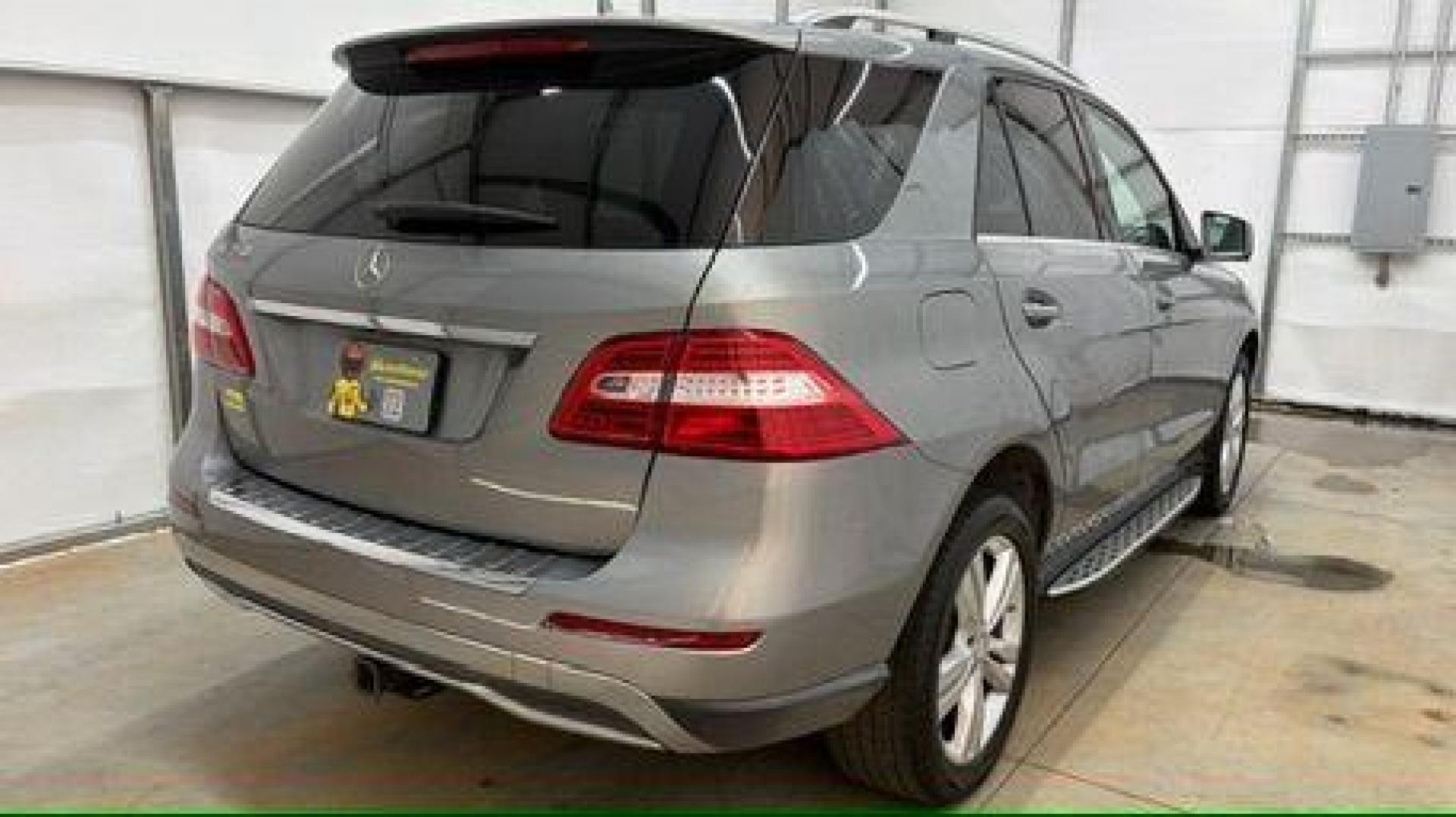 2015 Silver Mercedes-Benz ML 350 Class (4JGDA5JB3FA) , located at 1806 Veterans Memorial Hwy SW, Austell, GA, 30168, (770) 944-9558, 33.817959, -84.606987 - Photo#5