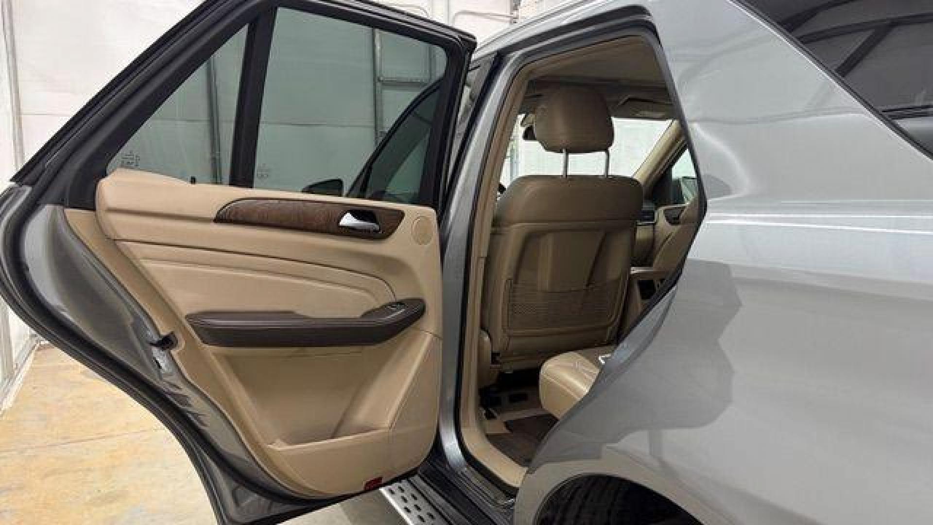 2015 Silver Mercedes-Benz ML 350 Class (4JGDA5JB3FA) , located at 1806 Veterans Memorial Hwy SW, Austell, GA, 30168, (770) 944-9558, 33.817959, -84.606987 - Photo#12