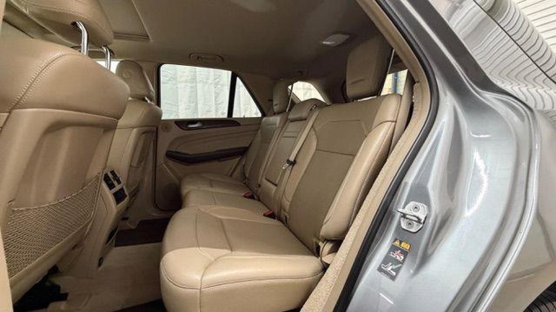 2015 Silver Mercedes-Benz ML 350 Class (4JGDA5JB3FA) , located at 1806 Veterans Memorial Hwy SW, Austell, GA, 30168, (770) 944-9558, 33.817959, -84.606987 - Photo#13