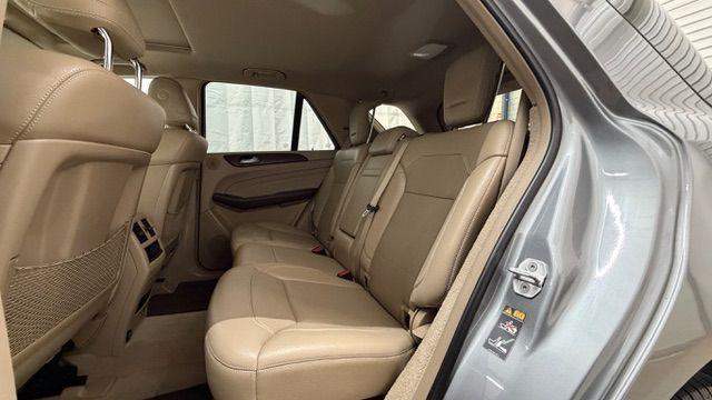 2015 Silver Mercedes-Benz ML 350 Class (4JGDA5JB3FA) , located at 1806 Veterans Memorial Hwy SW, Austell, GA, 30168, (770) 944-9558, 33.817959, -84.606987 - Photo#13