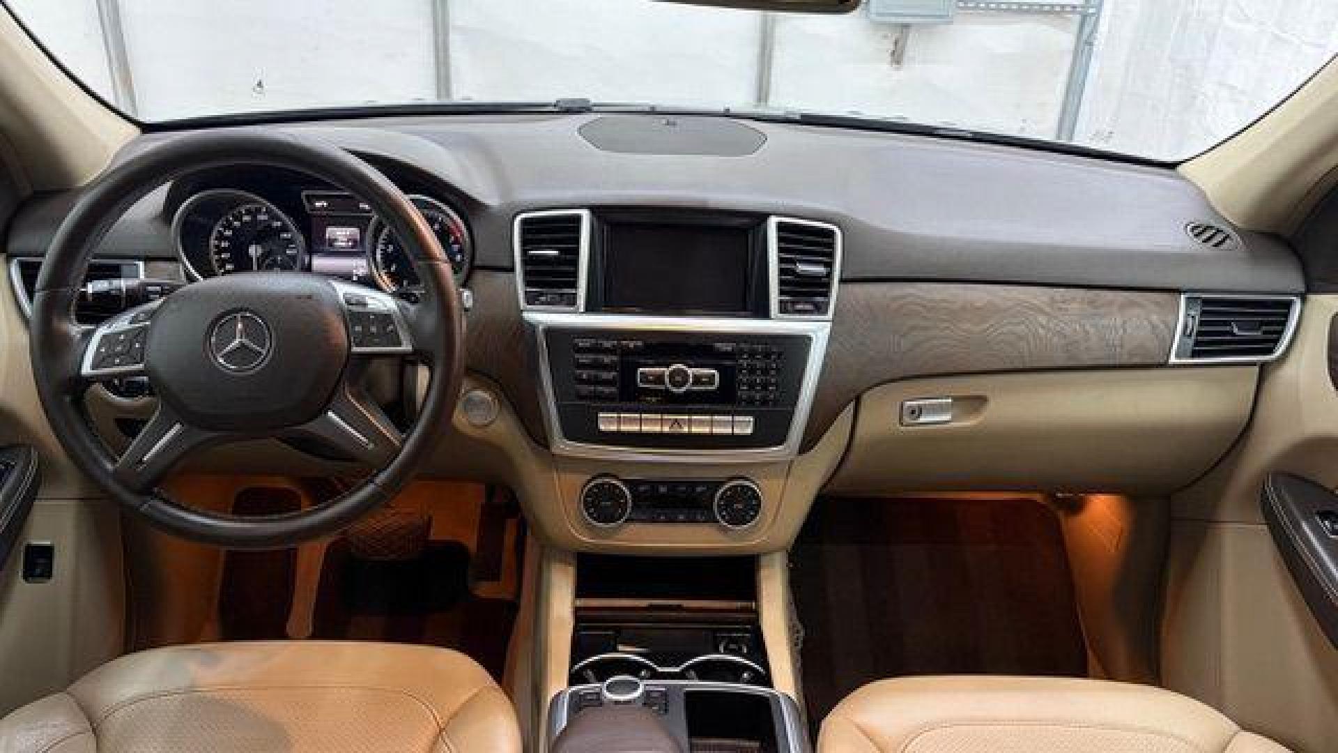 2015 Silver Mercedes-Benz ML 350 Class (4JGDA5JB3FA) , located at 1806 Veterans Memorial Hwy SW, Austell, GA, 30168, (770) 944-9558, 33.817959, -84.606987 - Photo#14