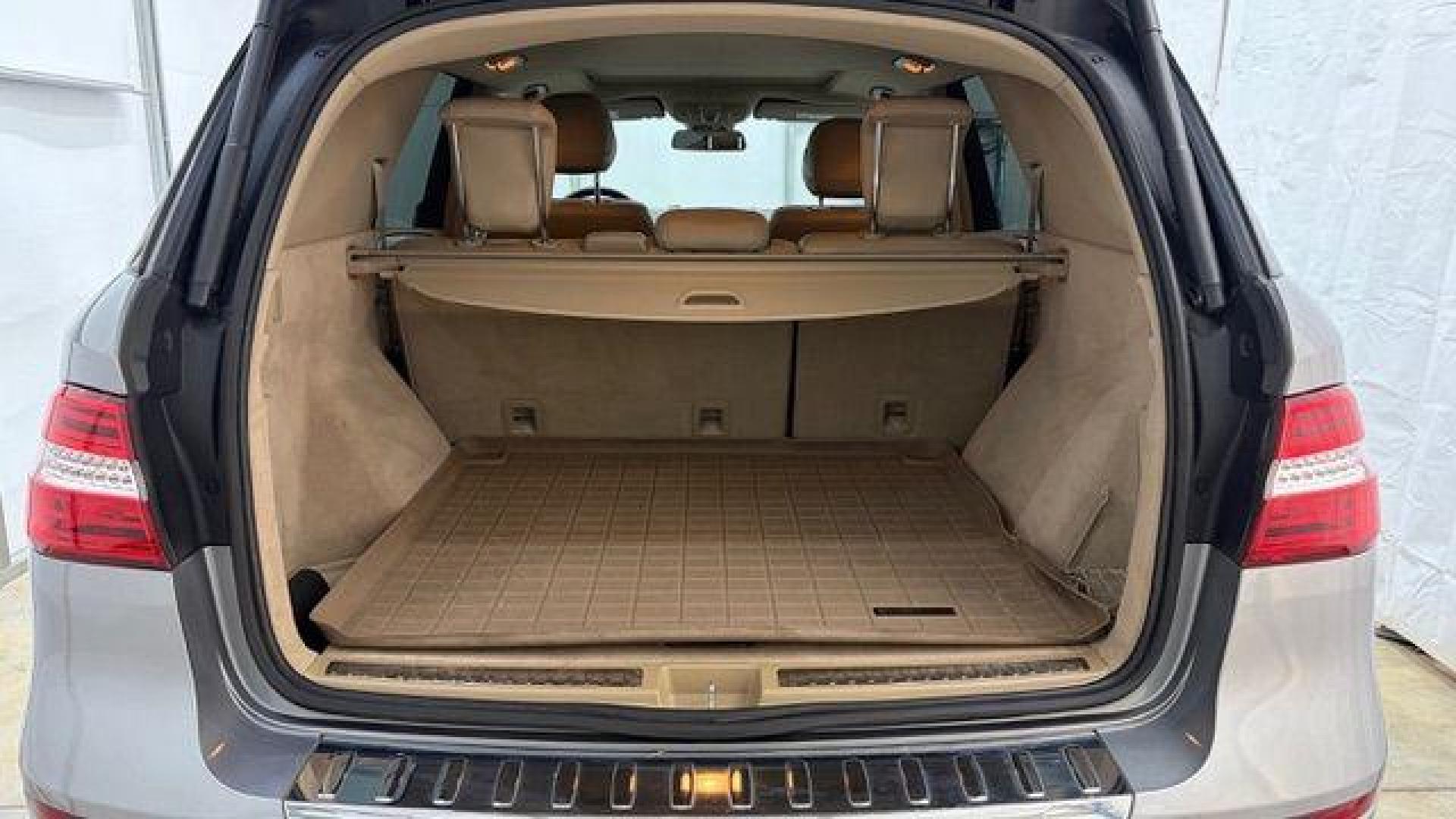 2015 Silver Mercedes-Benz ML 350 Class (4JGDA5JB3FA) , located at 1806 Veterans Memorial Hwy SW, Austell, GA, 30168, (770) 944-9558, 33.817959, -84.606987 - Photo#15