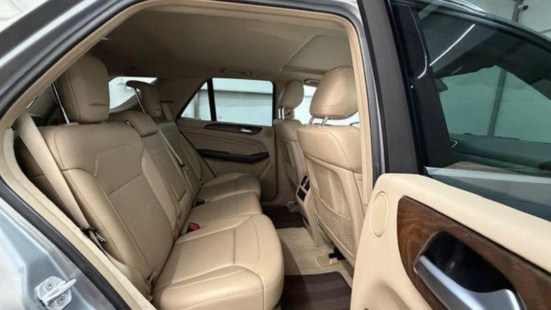 2015 Silver Mercedes-Benz ML 350 Class (4JGDA5JB3FA) , located at 1806 Veterans Memorial Hwy SW, Austell, GA, 30168, (770) 944-9558, 33.817959, -84.606987 - Photo#16