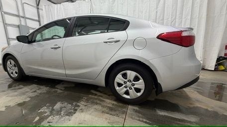 2015 Silver Kia Forte LX (KNAFK4A65F5) with an 1.8L I-4 DOHC engine, located at 1806 Veterans Memorial Hwy SW, Austell, GA, 30168, (770) 944-9558, 33.817959, -84.606987 - Photo#2