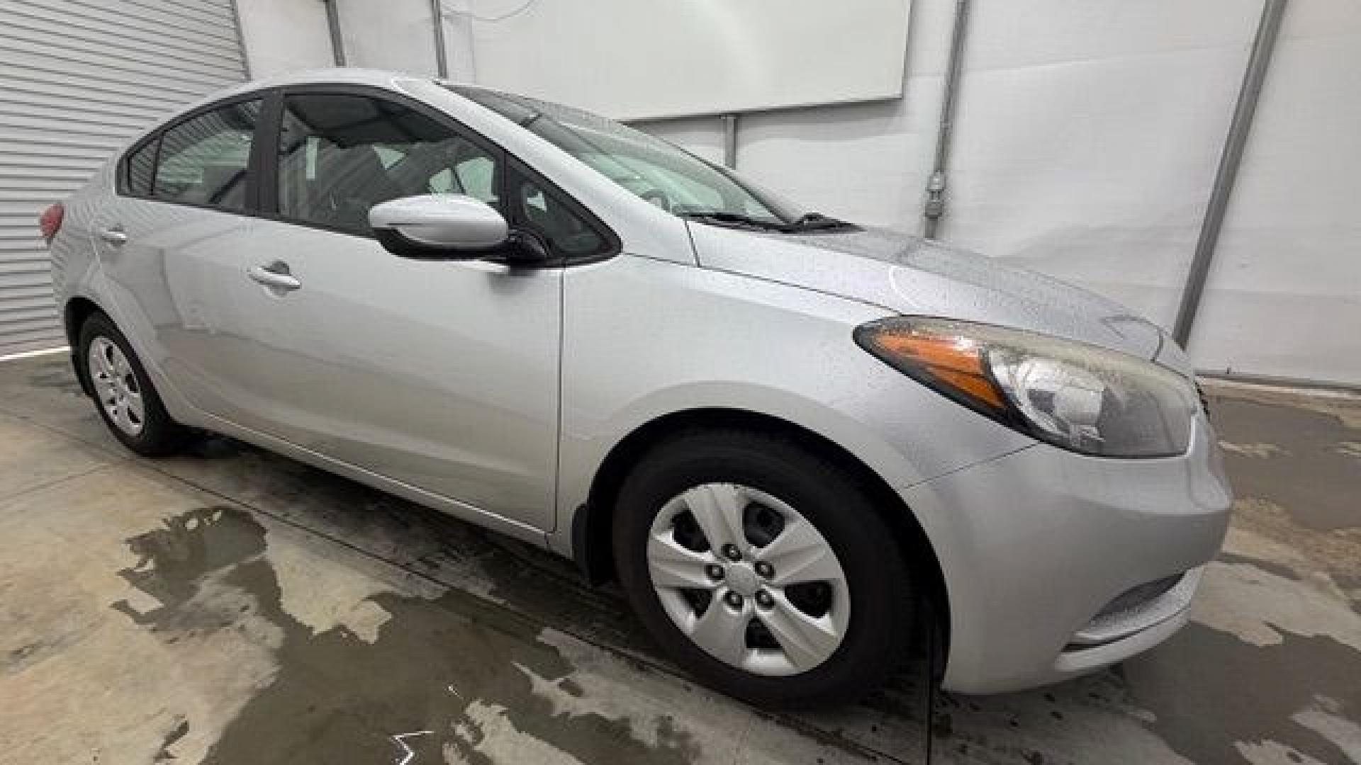 2015 Silver Kia Forte LX (KNAFK4A65F5) with an 1.8L I-4 DOHC engine, located at 1806 Veterans Memorial Hwy SW, Austell, GA, 30168, (770) 944-9558, 33.817959, -84.606987- Photo#7