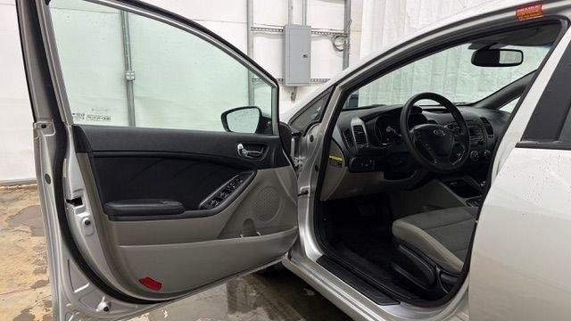 2015 Silver Kia Forte LX (KNAFK4A65F5) with an 1.8L I-4 DOHC engine, located at 1806 Veterans Memorial Hwy SW, Austell, GA, 30168, (770) 944-9558, 33.817959, -84.606987 - Photo#10