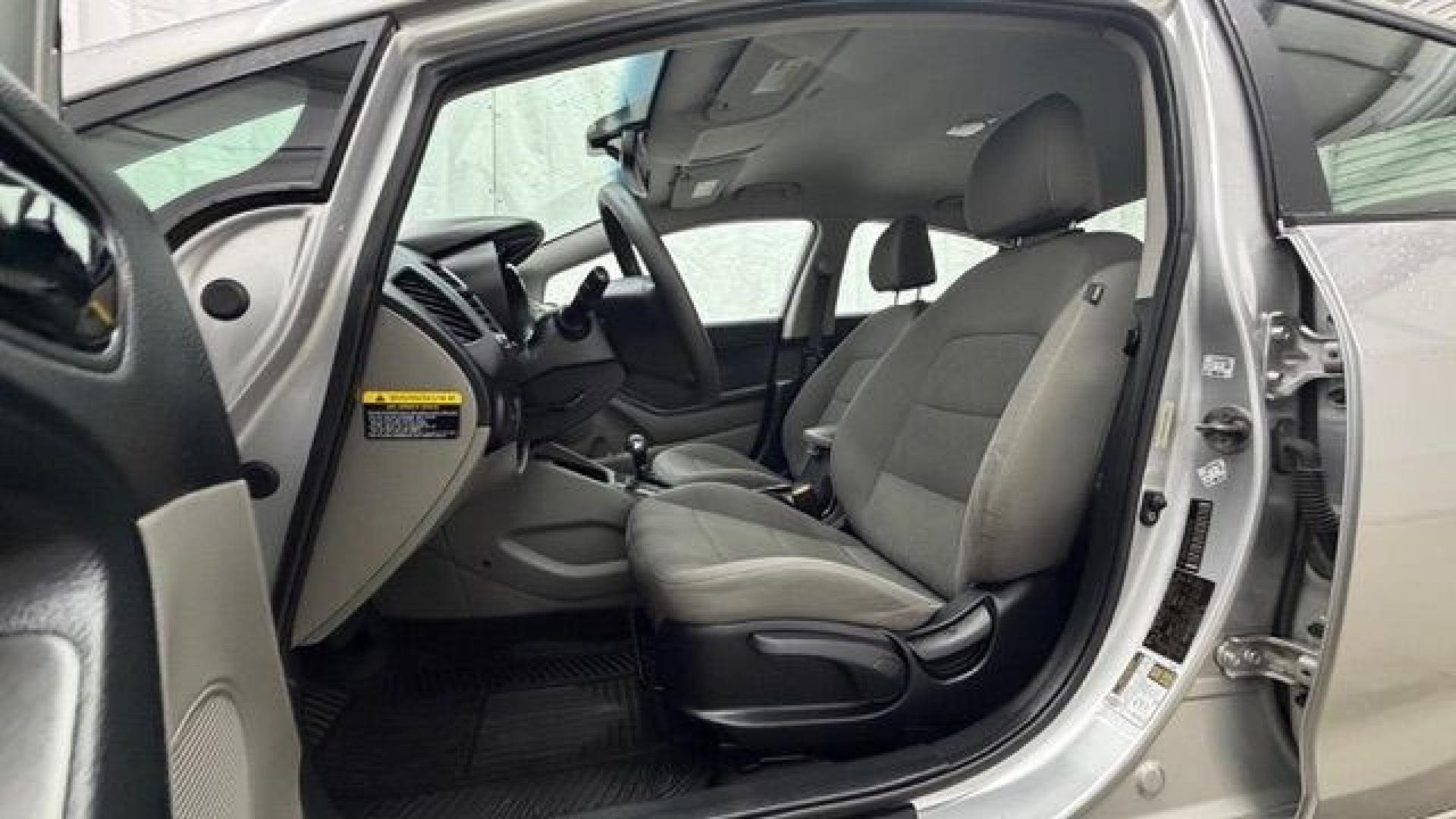 2015 Silver Kia Forte LX (KNAFK4A65F5) with an 1.8L I-4 DOHC engine, located at 1806 Veterans Memorial Hwy SW, Austell, GA, 30168, (770) 944-9558, 33.817959, -84.606987- Photo#12