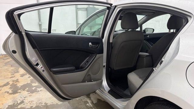 2015 Silver Kia Forte LX (KNAFK4A65F5) with an 1.8L I-4 DOHC engine, located at 1806 Veterans Memorial Hwy SW, Austell, GA, 30168, (770) 944-9558, 33.817959, -84.606987 - Photo#13