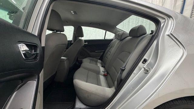 2015 Silver Kia Forte LX (KNAFK4A65F5) with an 1.8L I-4 DOHC engine, located at 1806 Veterans Memorial Hwy SW, Austell, GA, 30168, (770) 944-9558, 33.817959, -84.606987 - Photo#14