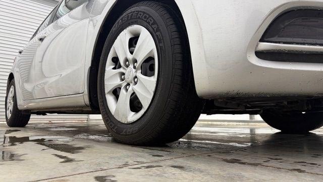 2015 Silver Kia Forte LX (KNAFK4A65F5) with an 1.8L I-4 DOHC engine, located at 1806 Veterans Memorial Hwy SW, Austell, GA, 30168, (770) 944-9558, 33.817959, -84.606987 - Photo#18