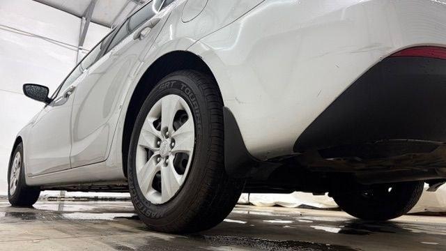 2015 Silver Kia Forte LX (KNAFK4A65F5) with an 1.8L I-4 DOHC engine, located at 1806 Veterans Memorial Hwy SW, Austell, GA, 30168, (770) 944-9558, 33.817959, -84.606987 - Photo#20