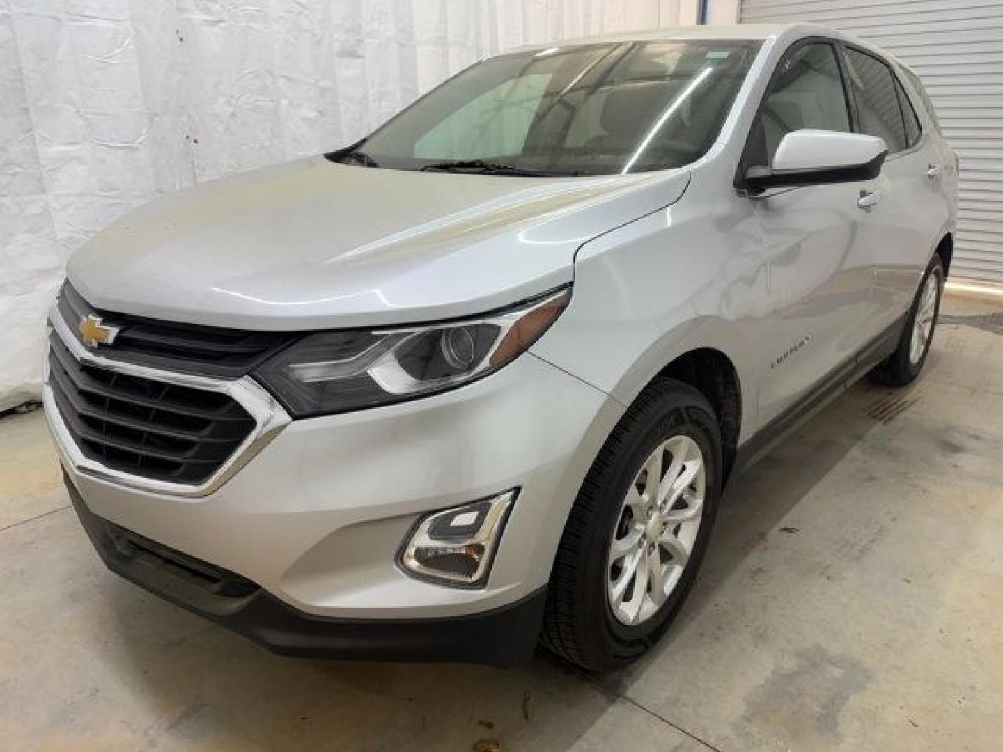 2018 Silver Chevrolet Equinox LT (3GNAXSEVXJS) with an 1.5L I-4 gasoline direct injection engine, located at 1806 Veterans Memorial Hwy SW, Austell, GA, 30168, (770) 944-9558, 33.817959, -84.606987 - Photo#0