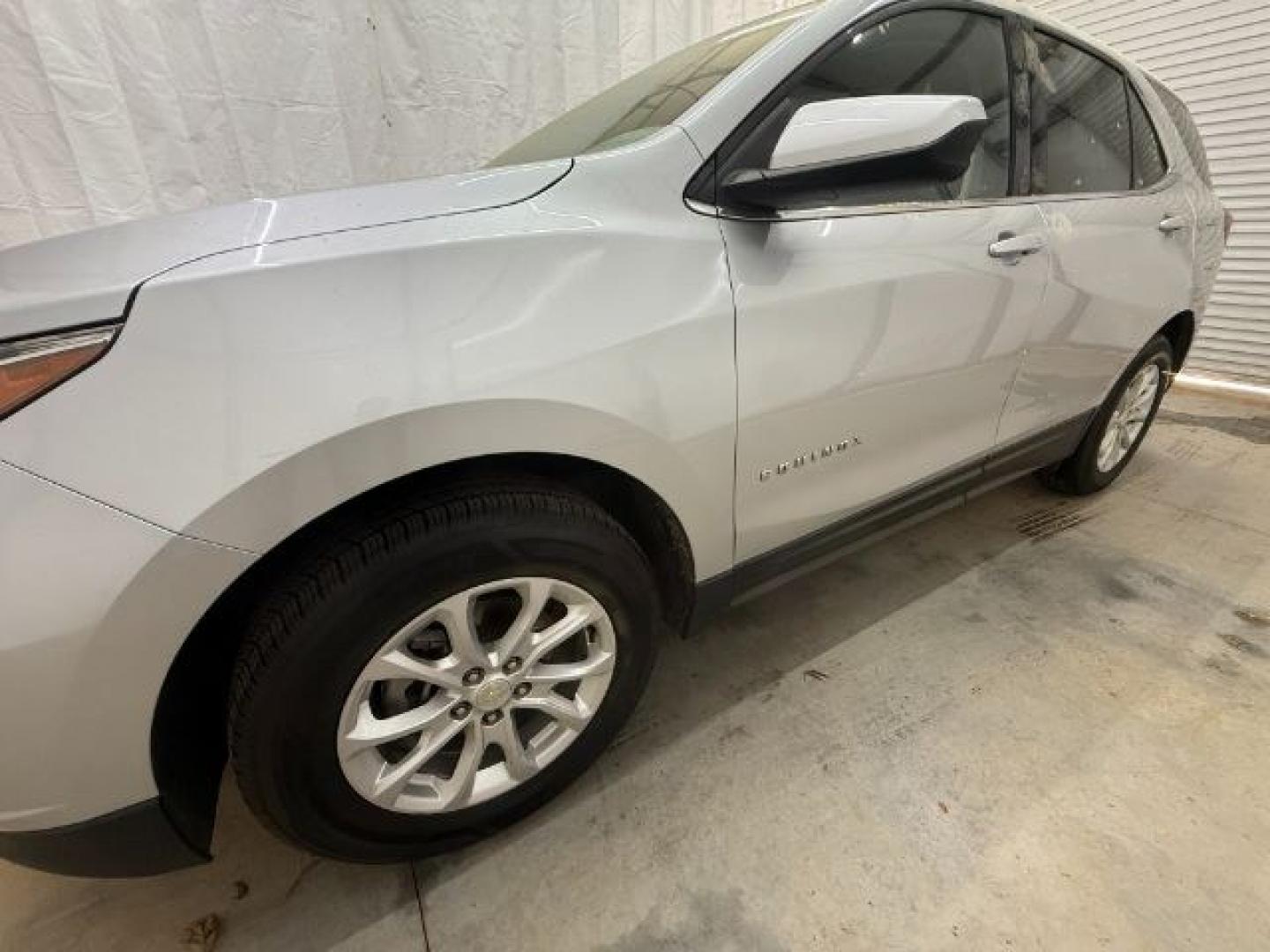 2018 Silver Chevrolet Equinox LT (3GNAXSEVXJS) with an 1.5L I-4 gasoline direct injection engine, located at 1806 Veterans Memorial Hwy SW, Austell, GA, 30168, (770) 944-9558, 33.817959, -84.606987 - Photo#1