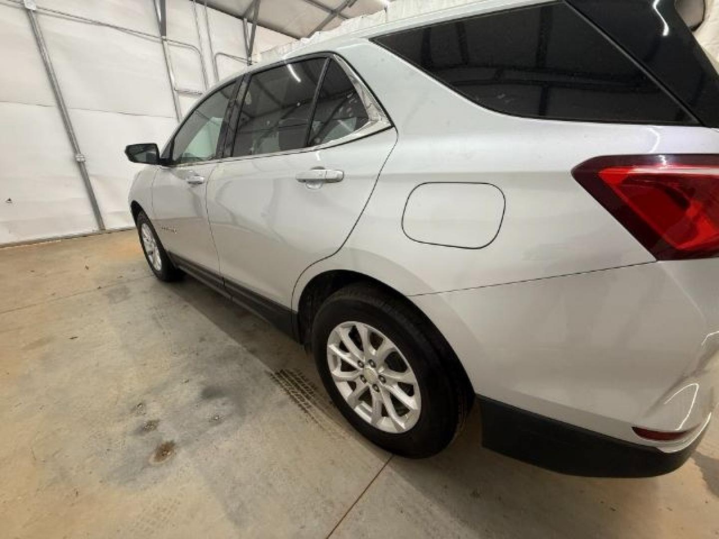 2018 Silver Chevrolet Equinox LT (3GNAXSEVXJS) with an 1.5L I-4 gasoline direct injection engine, located at 1806 Veterans Memorial Hwy SW, Austell, GA, 30168, (770) 944-9558, 33.817959, -84.606987 - Photo#2