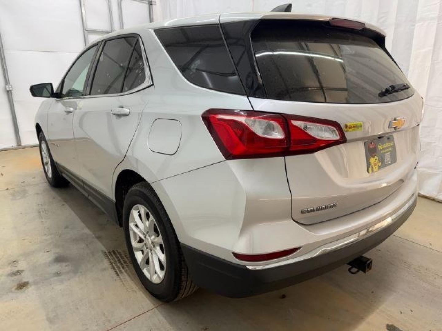 2018 Silver Chevrolet Equinox LT (3GNAXSEVXJS) with an 1.5L I-4 gasoline direct injection engine, located at 1806 Veterans Memorial Hwy SW, Austell, GA, 30168, (770) 944-9558, 33.817959, -84.606987 - Photo#3
