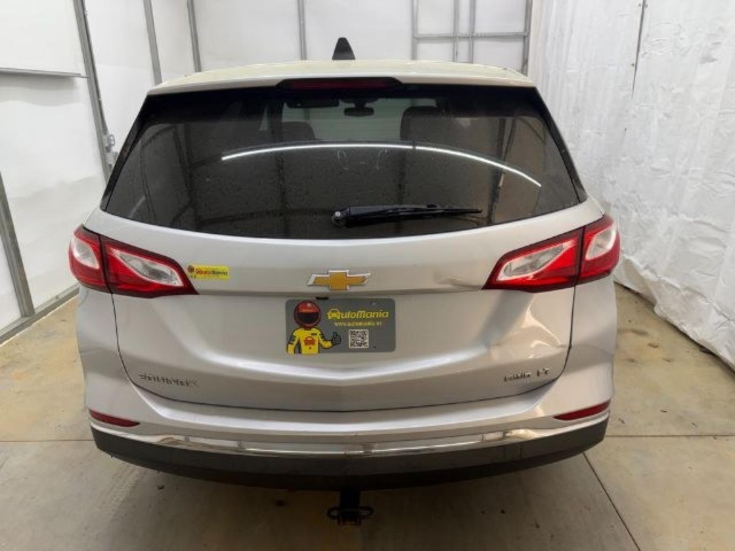 2018 Silver Chevrolet Equinox LT (3GNAXSEVXJS) with an 1.5L I-4 gasoline direct injection engine, located at 1806 Veterans Memorial Hwy SW, Austell, GA, 30168, (770) 944-9558, 33.817959, -84.606987 - Photo#4
