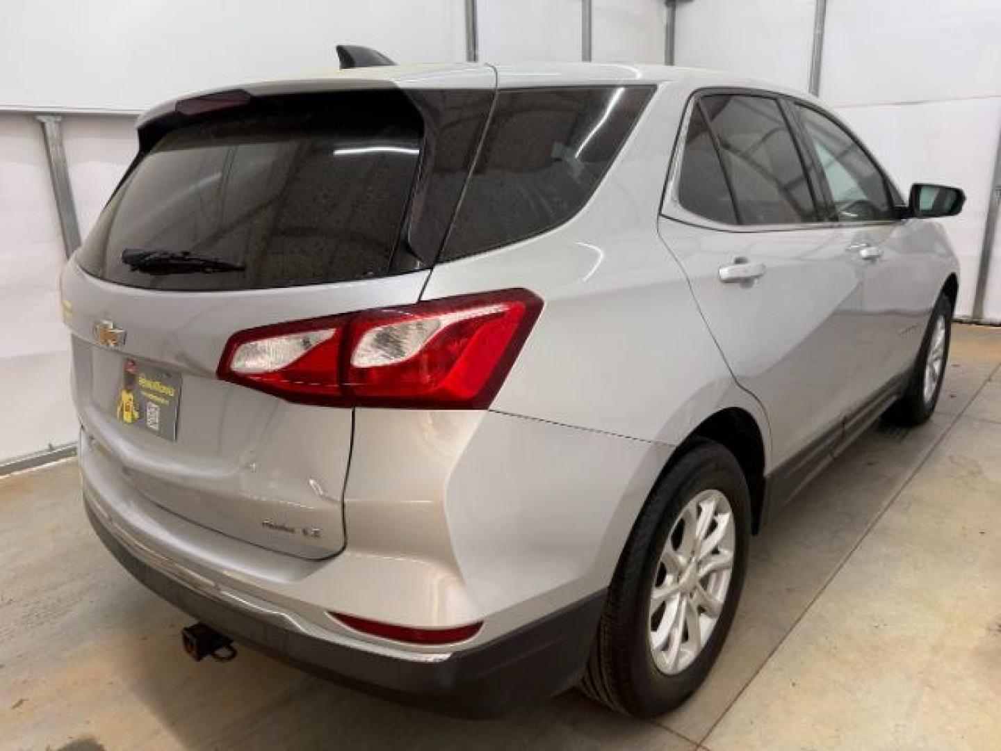 2018 Silver Chevrolet Equinox LT (3GNAXSEVXJS) with an 1.5L I-4 gasoline direct injection engine, located at 1806 Veterans Memorial Hwy SW, Austell, GA, 30168, (770) 944-9558, 33.817959, -84.606987 - Photo#5