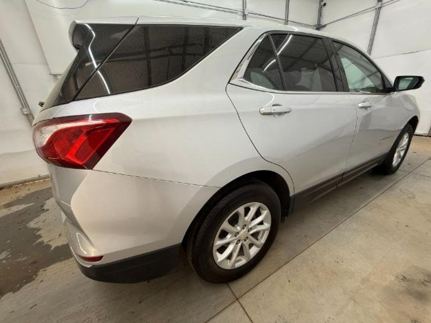 2018 Silver Chevrolet Equinox LT (3GNAXSEVXJS) with an 1.5L I-4 gasoline direct injection engine, located at 1806 Veterans Memorial Hwy SW, Austell, GA, 30168, (770) 944-9558, 33.817959, -84.606987 - Photo#6