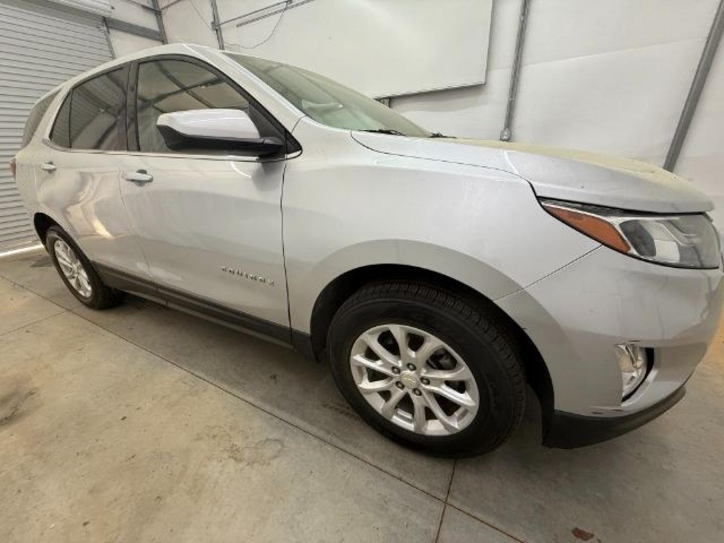 2018 Silver Chevrolet Equinox LT (3GNAXSEVXJS) with an 1.5L I-4 gasoline direct injection engine, located at 1806 Veterans Memorial Hwy SW, Austell, GA, 30168, (770) 944-9558, 33.817959, -84.606987 - Photo#7
