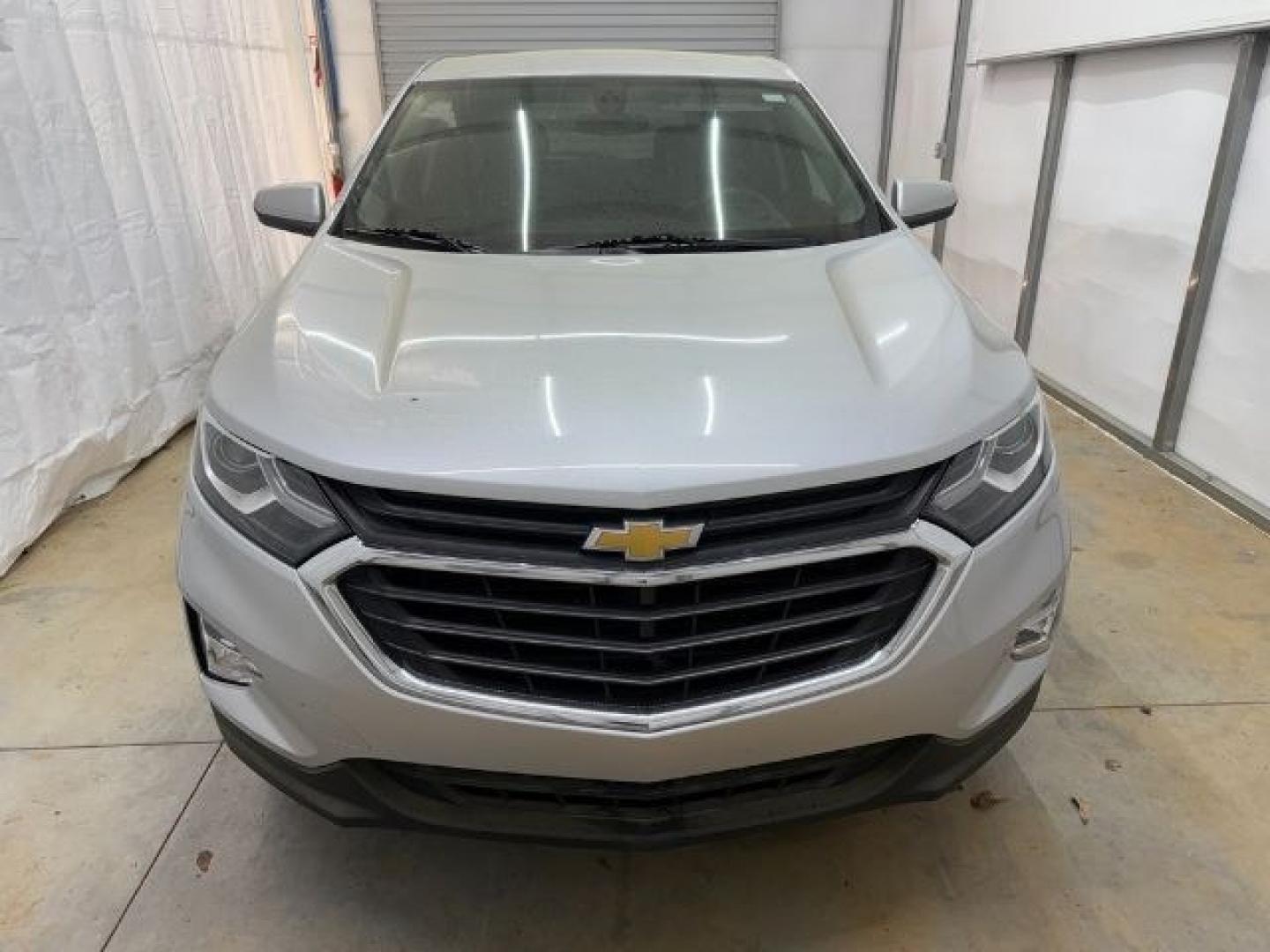 2018 Silver Chevrolet Equinox LT (3GNAXSEVXJS) with an 1.5L I-4 gasoline direct injection engine, located at 1806 Veterans Memorial Hwy SW, Austell, GA, 30168, (770) 944-9558, 33.817959, -84.606987 - Photo#9
