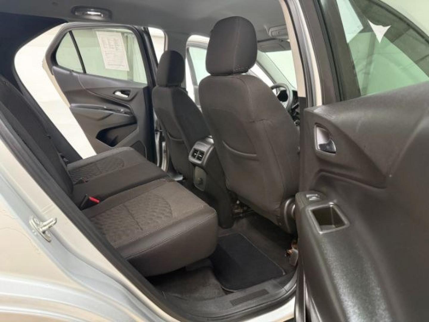 2018 Silver Chevrolet Equinox LT (3GNAXSEVXJS) with an 1.5L I-4 gasoline direct injection engine, located at 1806 Veterans Memorial Hwy SW, Austell, GA, 30168, (770) 944-9558, 33.817959, -84.606987 - Photo#14
