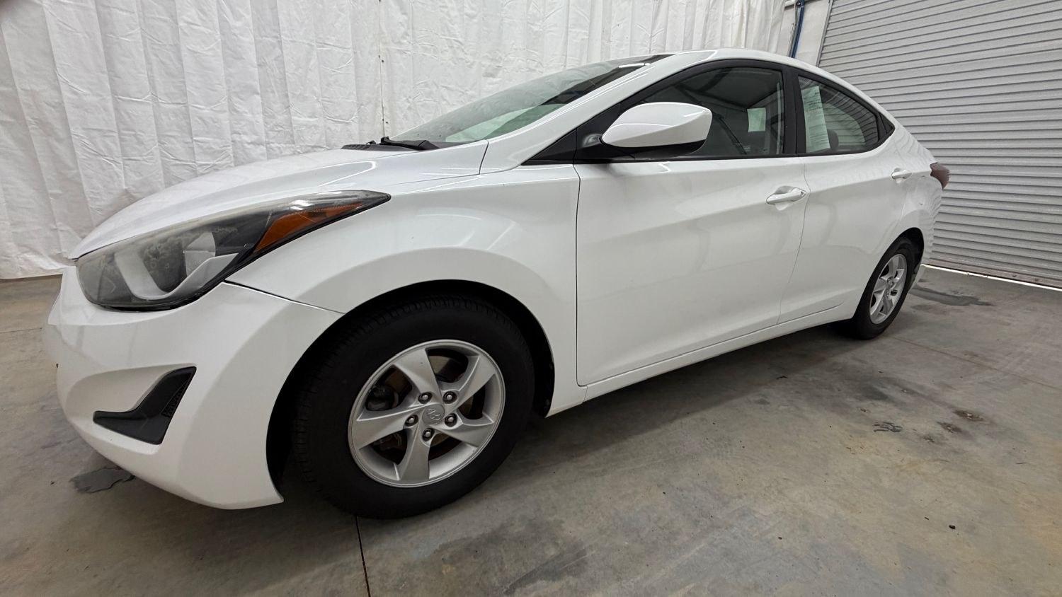2014 White Hyundai Elantra SE (5NPDH4AE5EH) with an Nu 1.8L I-4 DOHC engine, located at 1806 Veterans Memorial Hwy SW, Austell, GA, 30168, (770) 944-9558, 33.817959, -84.606987- Photo#1