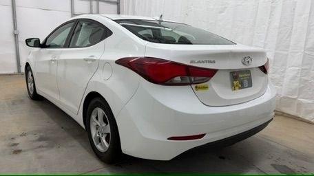 2014 White Hyundai Elantra SE (5NPDH4AE5EH) with an Nu 1.8L I-4 DOHC engine, located at 1806 Veterans Memorial Hwy SW, Austell, GA, 30168, (770) 944-9558, 33.817959, -84.606987- Photo#3
