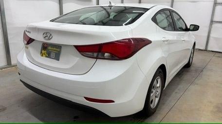 2014 White Hyundai Elantra SE (5NPDH4AE5EH) with an Nu 1.8L I-4 DOHC engine, located at 1806 Veterans Memorial Hwy SW, Austell, GA, 30168, (770) 944-9558, 33.817959, -84.606987- Photo#5