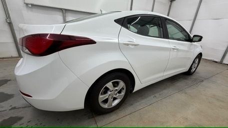 2014 White Hyundai Elantra SE (5NPDH4AE5EH) with an Nu 1.8L I-4 DOHC engine, located at 1806 Veterans Memorial Hwy SW, Austell, GA, 30168, (770) 944-9558, 33.817959, -84.606987- Photo#6