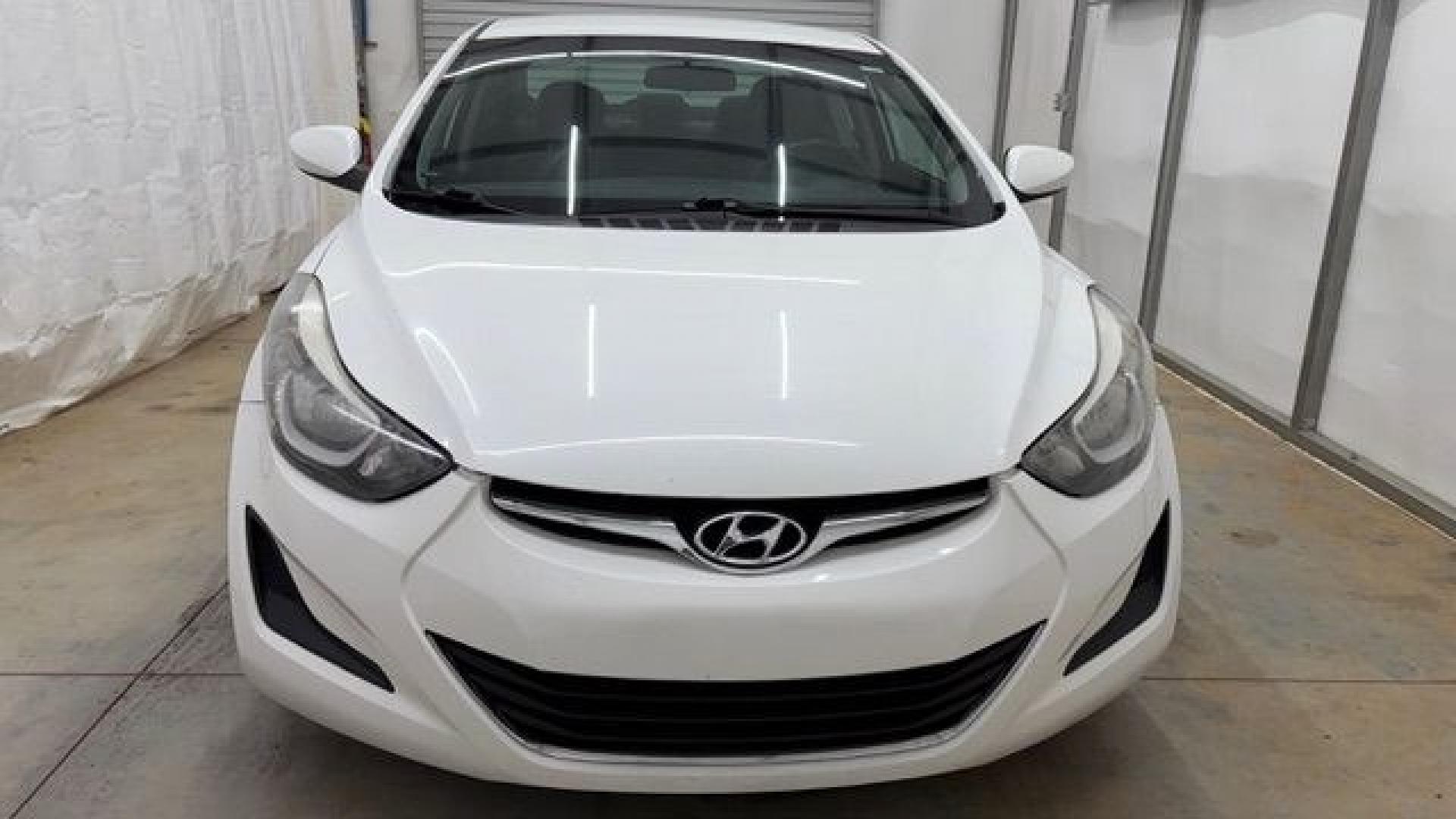 2014 White Hyundai Elantra SE (5NPDH4AE5EH) with an Nu 1.8L I-4 DOHC engine, located at 1806 Veterans Memorial Hwy SW, Austell, GA, 30168, (770) 944-9558, 33.817959, -84.606987- Photo#9