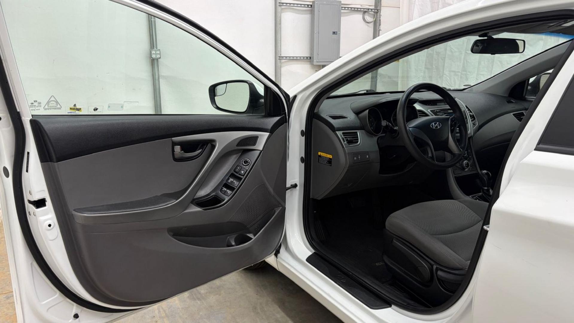 2014 White Hyundai Elantra SE (5NPDH4AE5EH) with an Nu 1.8L I-4 DOHC engine, located at 1806 Veterans Memorial Hwy SW, Austell, GA, 30168, (770) 944-9558, 33.817959, -84.606987- Photo#10