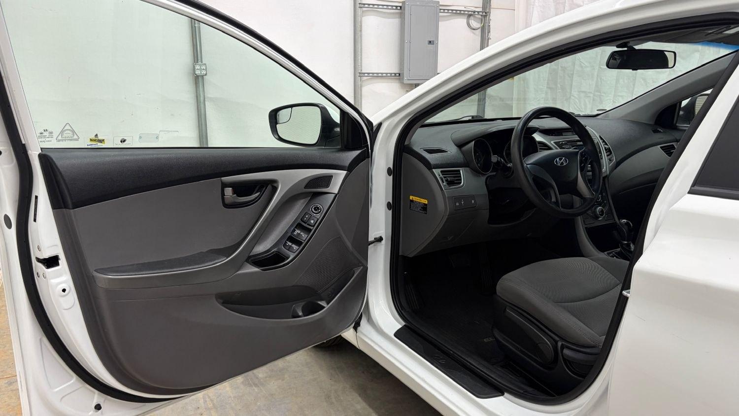2014 White Hyundai Elantra SE (5NPDH4AE5EH) with an Nu 1.8L I-4 DOHC engine, located at 1806 Veterans Memorial Hwy SW, Austell, GA, 30168, (770) 944-9558, 33.817959, -84.606987- Photo#10