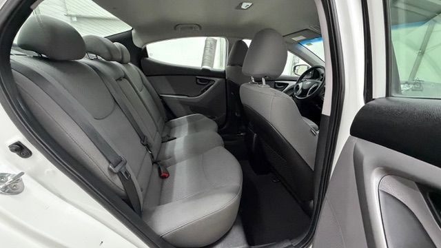 2014 White Hyundai Elantra SE (5NPDH4AE5EH) with an Nu 1.8L I-4 DOHC engine, located at 1806 Veterans Memorial Hwy SW, Austell, GA, 30168, (770) 944-9558, 33.817959, -84.606987- Photo#16