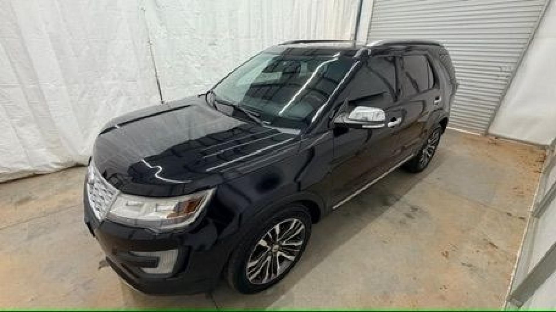 2016 Black Ford Explorer Platinum (1FM5K8HT0GG) with an EcoBoost 3.5L V-6 gasoline direct injection engine, located at 1806 Veterans Memorial Hwy SW, Austell, GA, 30168, (770) 944-9558, 33.817959, -84.606987 - Photo#1