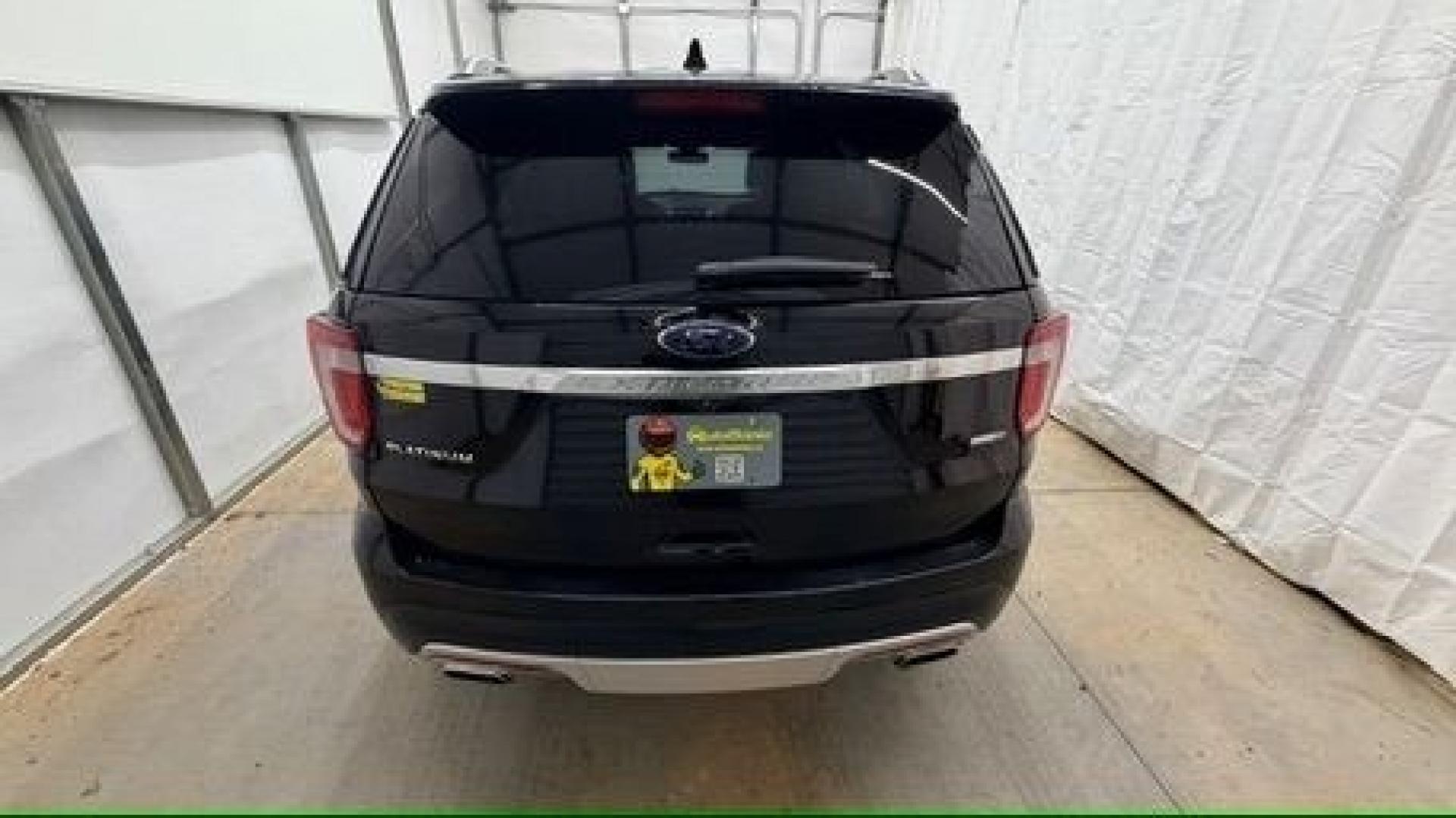 2016 Black Ford Explorer Platinum (1FM5K8HT0GG) with an EcoBoost 3.5L V-6 gasoline direct injection engine, located at 1806 Veterans Memorial Hwy SW, Austell, GA, 30168, (770) 944-9558, 33.817959, -84.606987 - Photo#4