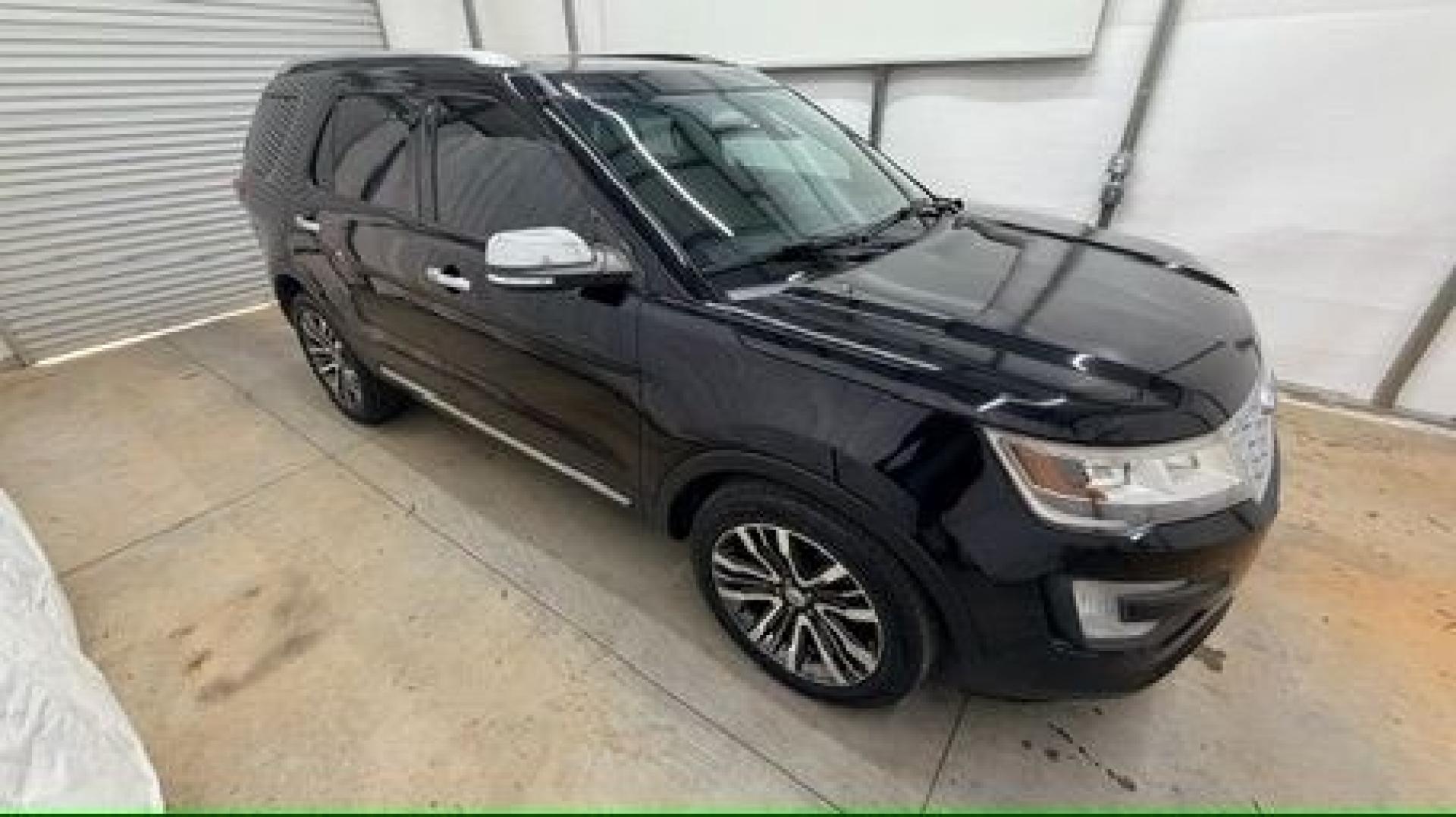 2016 Black Ford Explorer Platinum (1FM5K8HT0GG) with an EcoBoost 3.5L V-6 gasoline direct injection engine, located at 1806 Veterans Memorial Hwy SW, Austell, GA, 30168, (770) 944-9558, 33.817959, -84.606987 - Photo#7