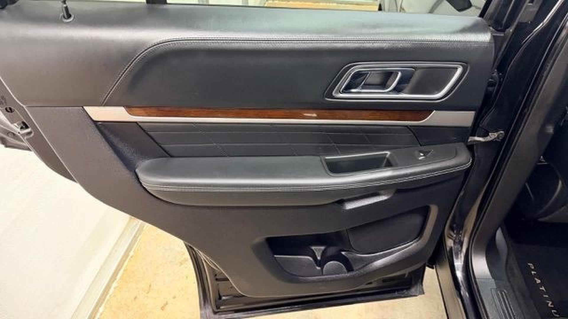 2016 Black Ford Explorer Platinum (1FM5K8HT0GG) with an EcoBoost 3.5L V-6 gasoline direct injection engine, located at 1806 Veterans Memorial Hwy SW, Austell, GA, 30168, (770) 944-9558, 33.817959, -84.606987 - Photo#12