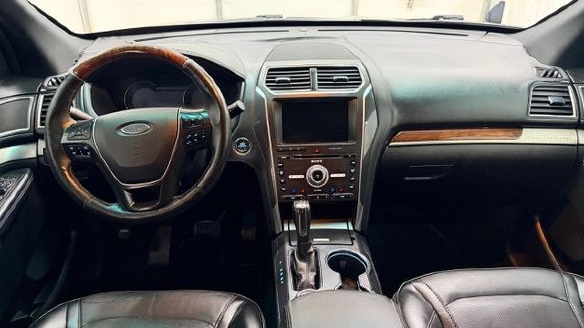 2016 Black Ford Explorer Platinum (1FM5K8HT0GG) with an EcoBoost 3.5L V-6 gasoline direct injection engine, located at 1806 Veterans Memorial Hwy SW, Austell, GA, 30168, (770) 944-9558, 33.817959, -84.606987 - Photo#14