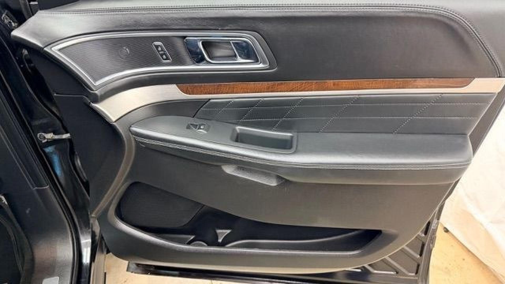 2016 Black Ford Explorer Platinum (1FM5K8HT0GG) with an EcoBoost 3.5L V-6 gasoline direct injection engine, located at 1806 Veterans Memorial Hwy SW, Austell, GA, 30168, (770) 944-9558, 33.817959, -84.606987 - Photo#17