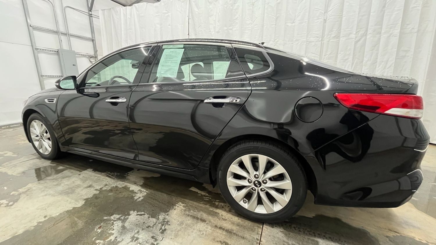 2018 Black Kia Optima EX (5XXGU4L30JG) with an Theta II 2.4L I-4 gasoline direct injection engine, located at 1806 Veterans Memorial Hwy SW, Austell, GA, 30168, (770) 944-9558, 33.817959, -84.606987 - Photo#2