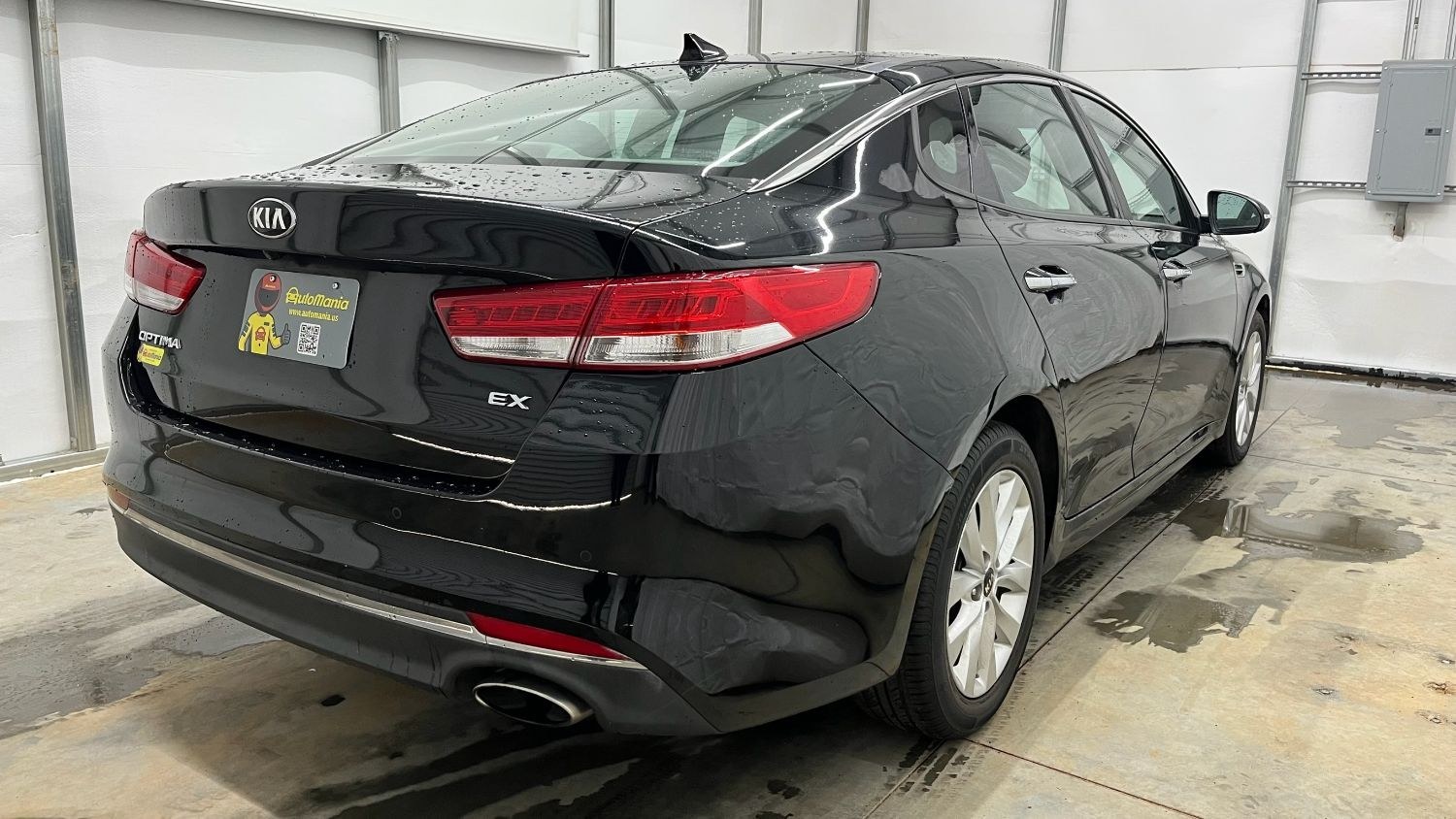 2018 Black Kia Optima EX (5XXGU4L30JG) with an Theta II 2.4L I-4 gasoline direct injection engine, located at 1806 Veterans Memorial Hwy SW, Austell, GA, 30168, (770) 944-9558, 33.817959, -84.606987 - Photo#5
