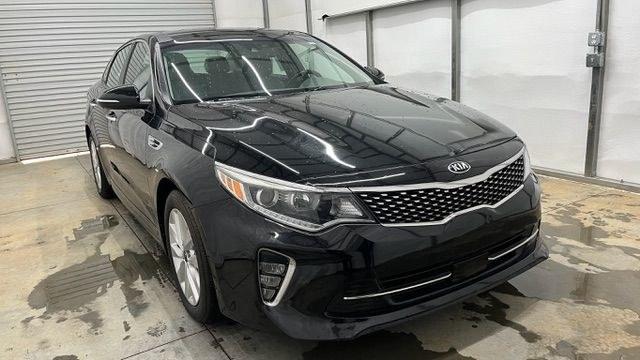 2018 Black Kia Optima EX (5XXGU4L30JG) with an Theta II 2.4L I-4 gasoline direct injection engine, located at 1806 Veterans Memorial Hwy SW, Austell, GA, 30168, (770) 944-9558, 33.817959, -84.606987 - Photo#8