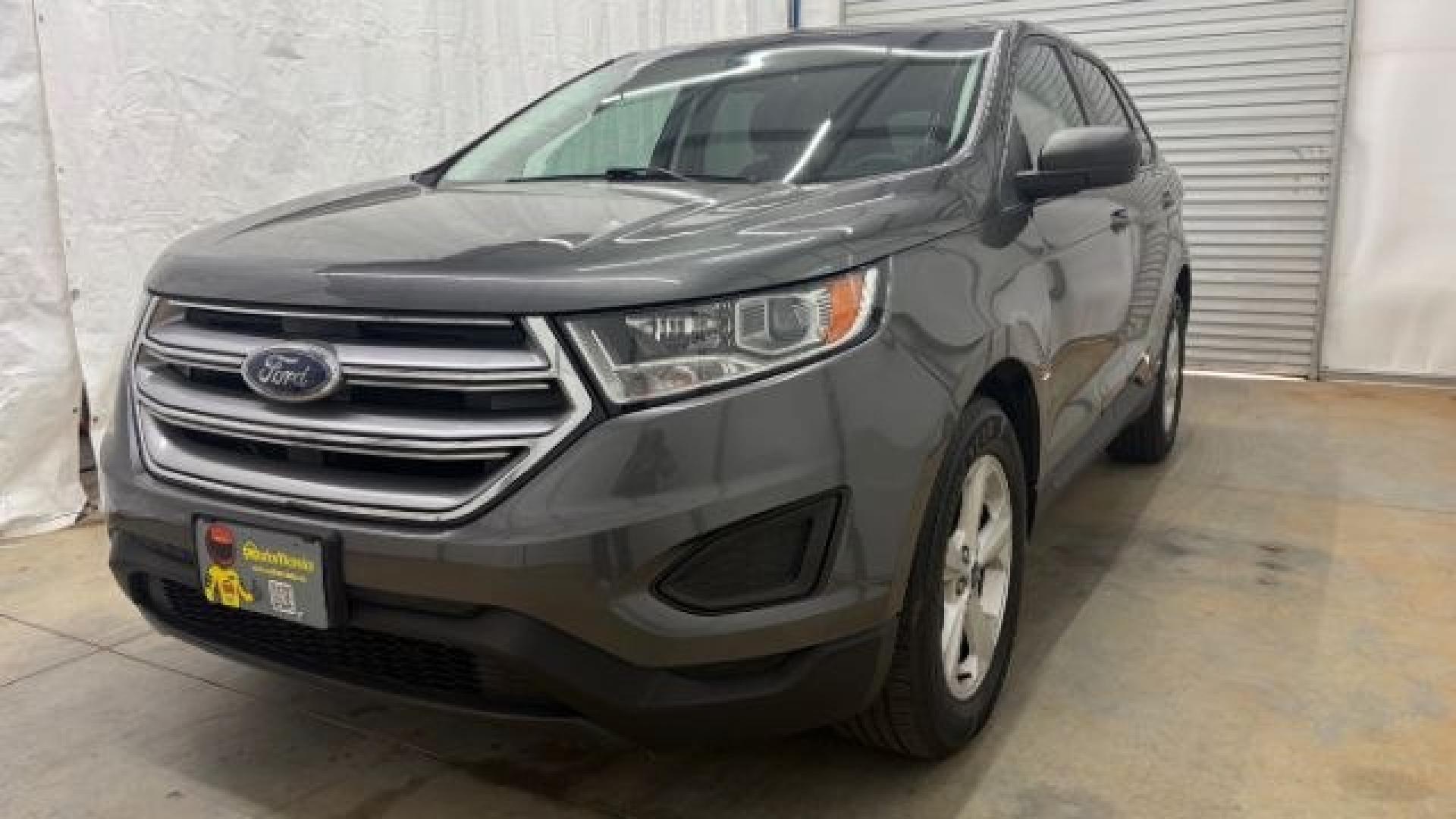 2016 Gray Ford Edge SE (2FMPK4G98GB) with an EcoBoost 2L I-4 gasoline direct injection engine, located at 1806 Veterans Memorial Hwy SW, Austell, GA, 30168, (770) 944-9558, 33.817959, -84.606987 - Photo#0