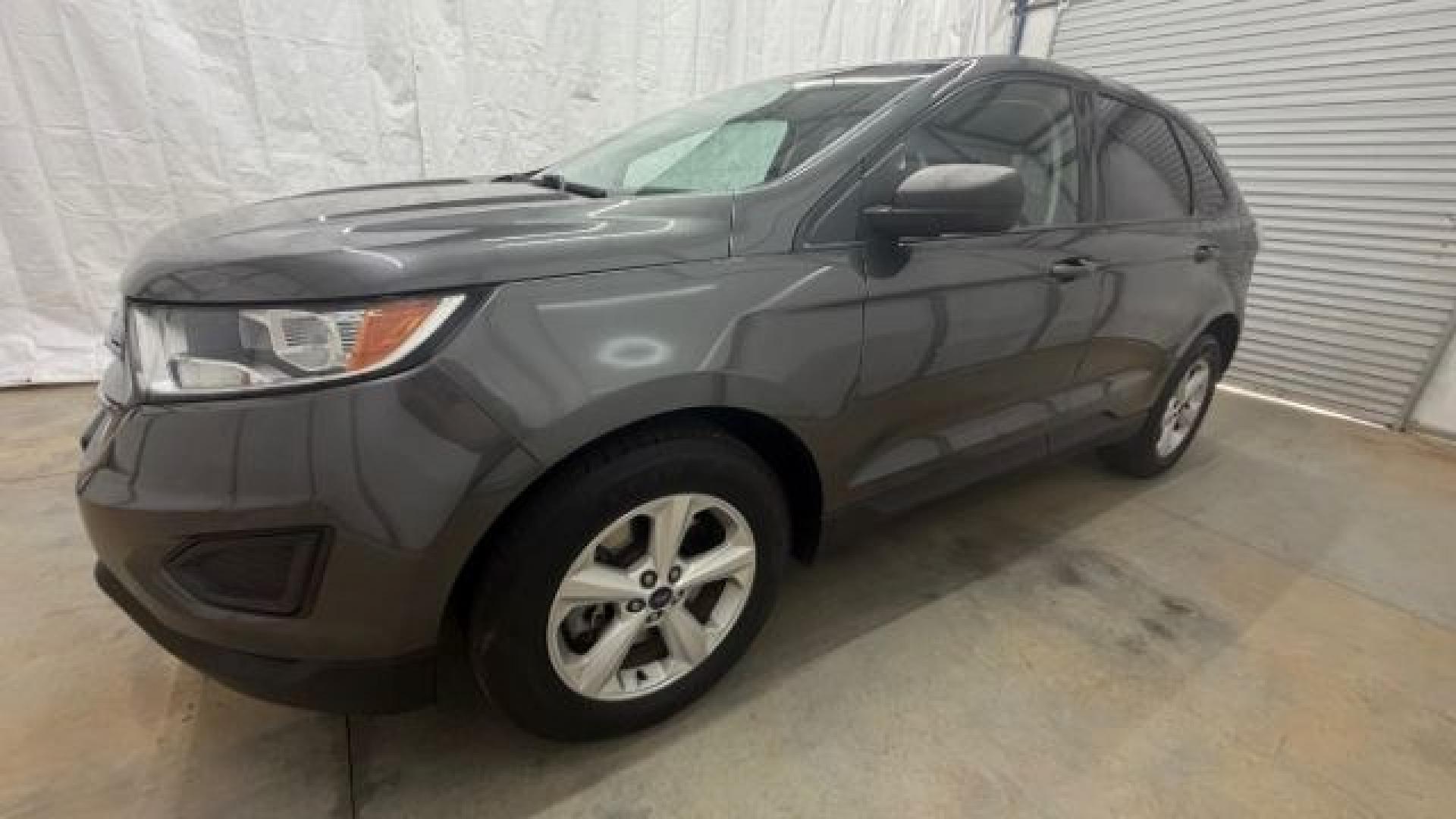 2016 Gray Ford Edge SE (2FMPK4G98GB) with an EcoBoost 2L I-4 gasoline direct injection engine, located at 1806 Veterans Memorial Hwy SW, Austell, GA, 30168, (770) 944-9558, 33.817959, -84.606987 - Photo#1