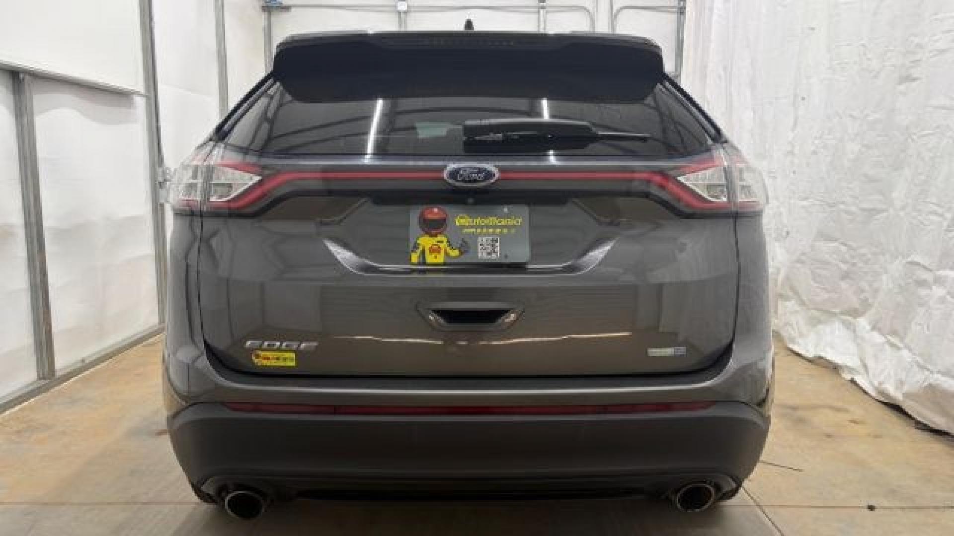 2016 Gray Ford Edge SE (2FMPK4G98GB) with an EcoBoost 2L I-4 gasoline direct injection engine, located at 1806 Veterans Memorial Hwy SW, Austell, GA, 30168, (770) 944-9558, 33.817959, -84.606987 - Photo#4