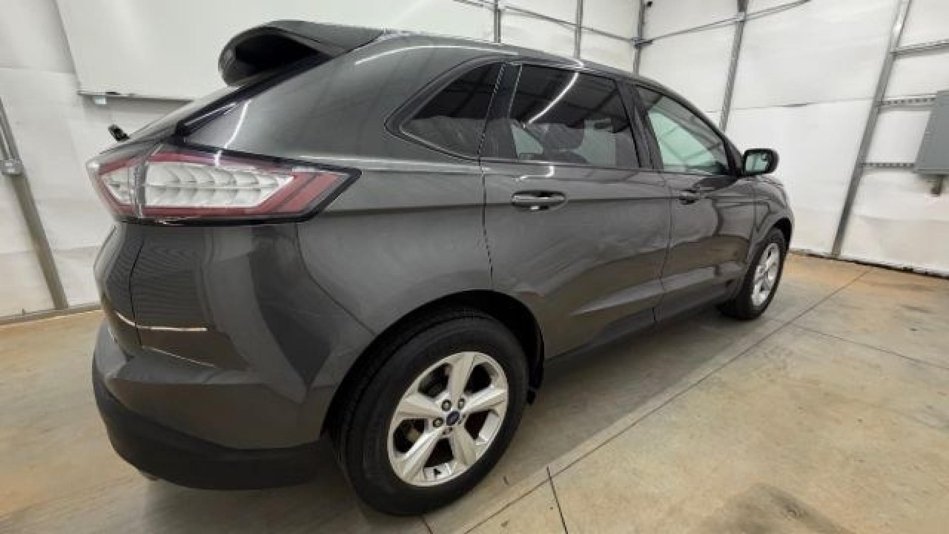 2016 Gray Ford Edge SE (2FMPK4G98GB) with an EcoBoost 2L I-4 gasoline direct injection engine, located at 1806 Veterans Memorial Hwy SW, Austell, GA, 30168, (770) 944-9558, 33.817959, -84.606987 - Photo#7