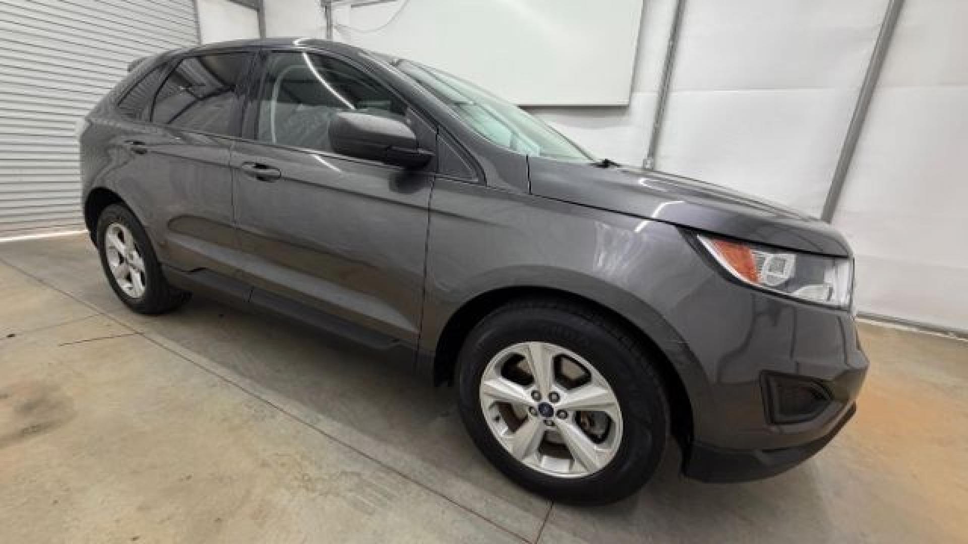 2016 Gray Ford Edge SE (2FMPK4G98GB) with an EcoBoost 2L I-4 gasoline direct injection engine, located at 1806 Veterans Memorial Hwy SW, Austell, GA, 30168, (770) 944-9558, 33.817959, -84.606987 - Photo#8